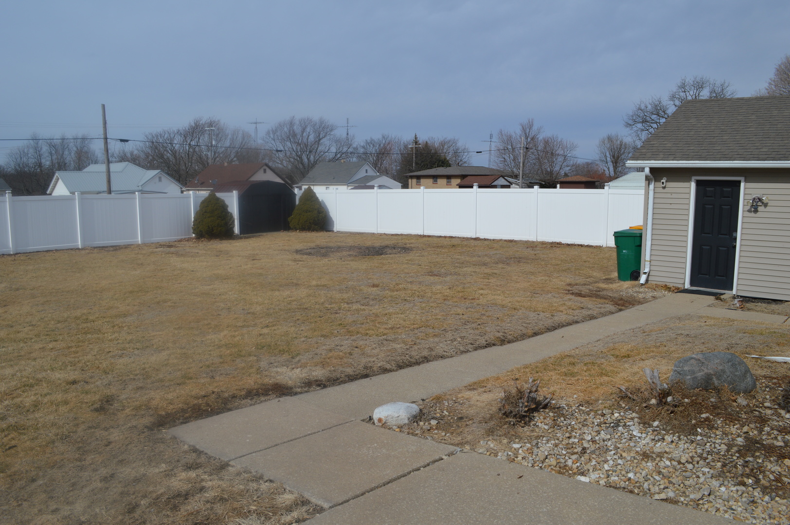 108 North Milwaukee Street Mark, IL 61340 - Photo 24 of 29 a view of a dry yard with wooden fence