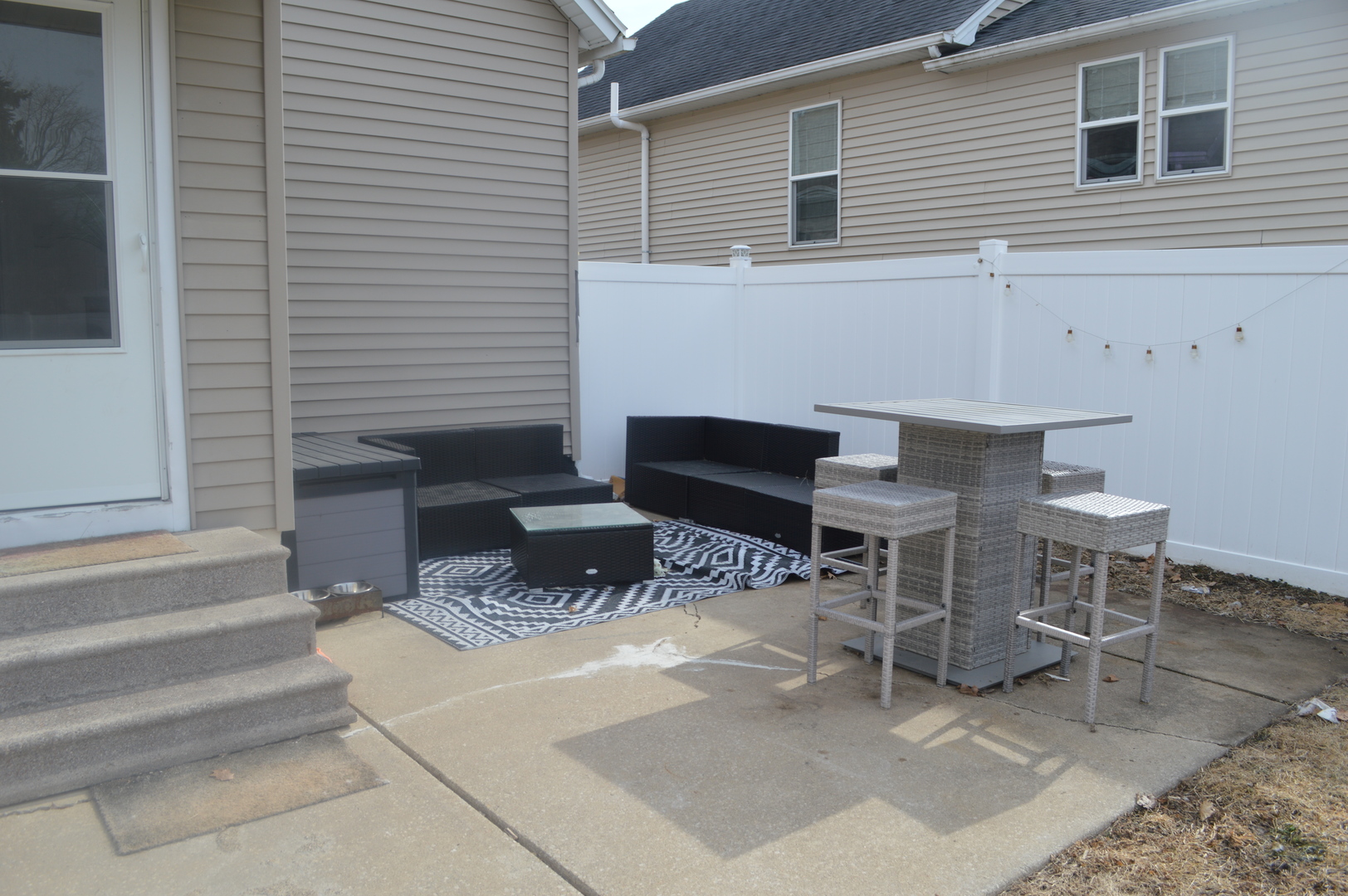 108 North Milwaukee Street Mark, IL 61340 - Photo 29 of 29 a patio with table and chairs