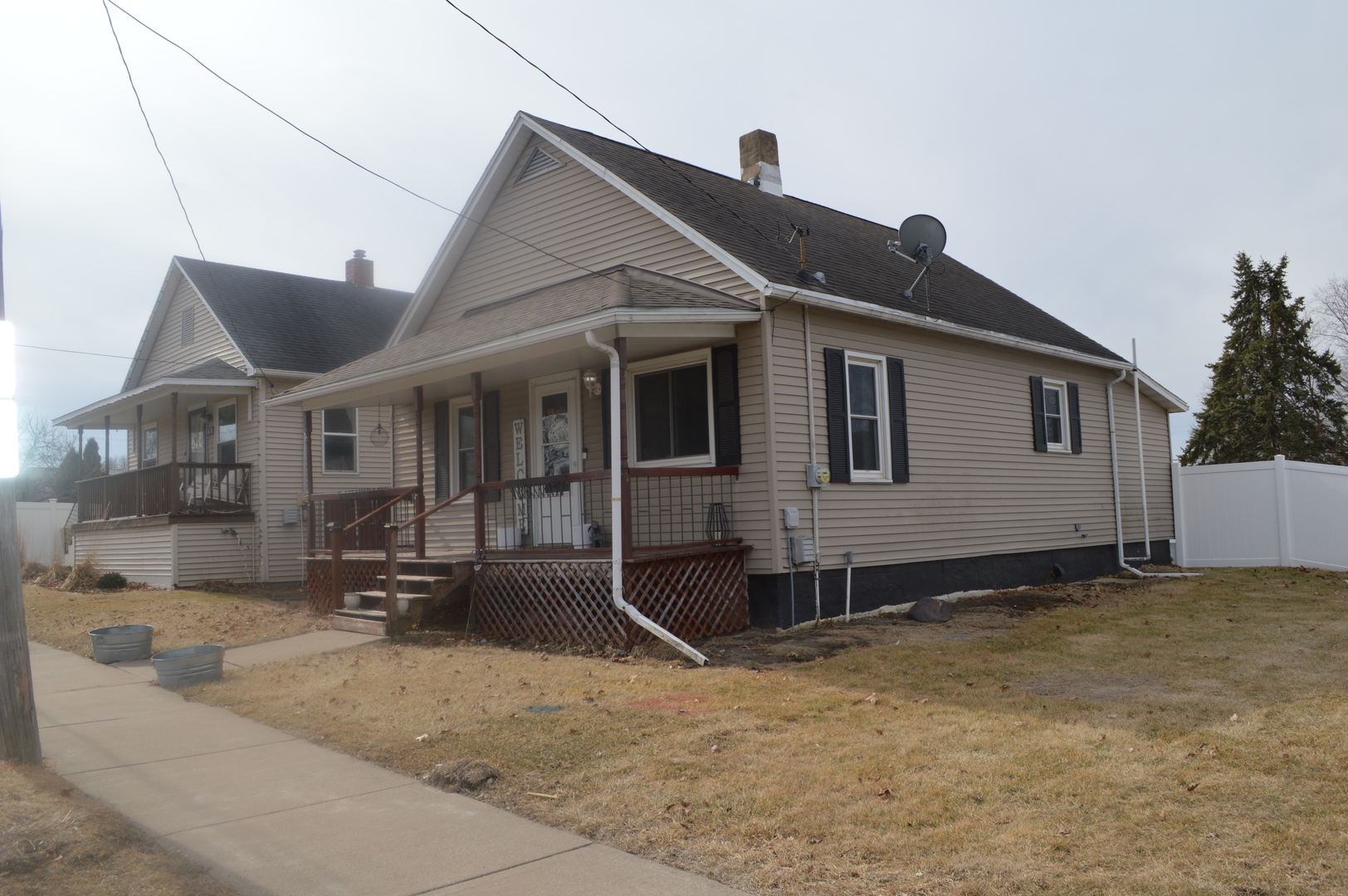 108 North Milwaukee Street Mark, IL 61340 - Photo 3 of 29 a front view of a house with yard