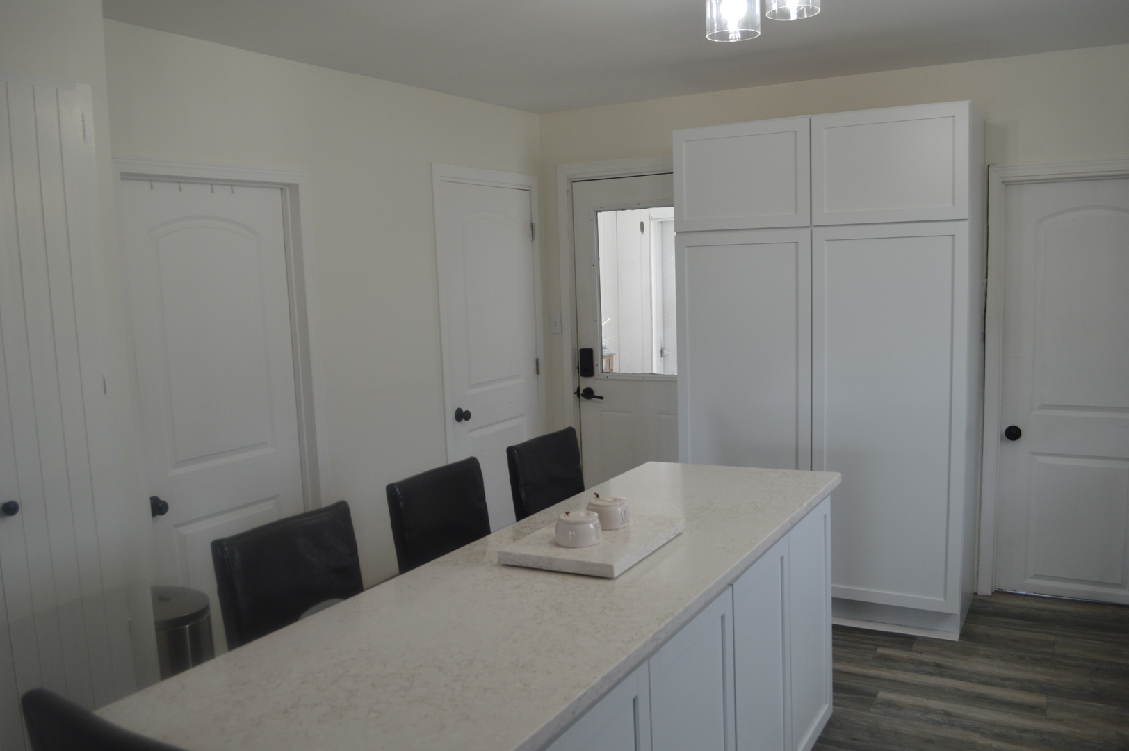 108 North Milwaukee Street Mark, IL 61340 - Photo 9 of 29 a bedroom with a bed and a table in it