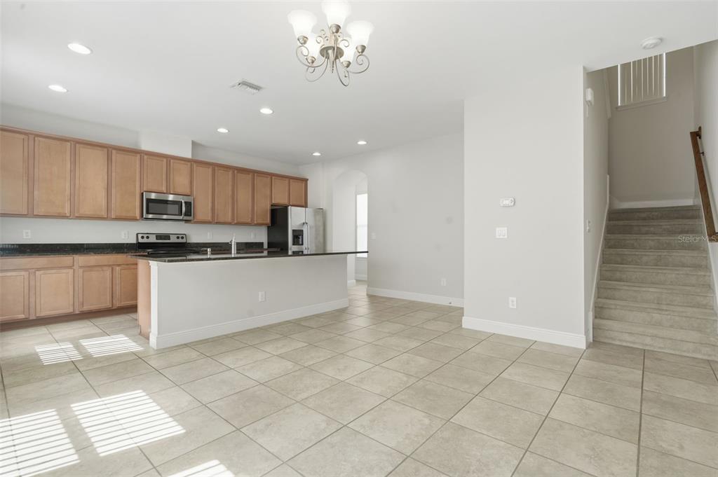 11486 Misty Oak Alley Windermere, FL 34786 - Photo 17 of 47 a view of kitchen with stainless steel appliances cabinets and a counter top space