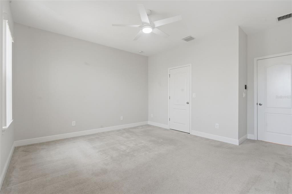 11486 Misty Oak Alley Windermere, FL 34786 - Photo 28 of 47 wooden floor in an empty room