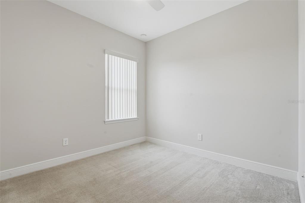 11486 Misty Oak Alley Windermere, FL 34786 - Photo 32 of 47 an empty room with a window