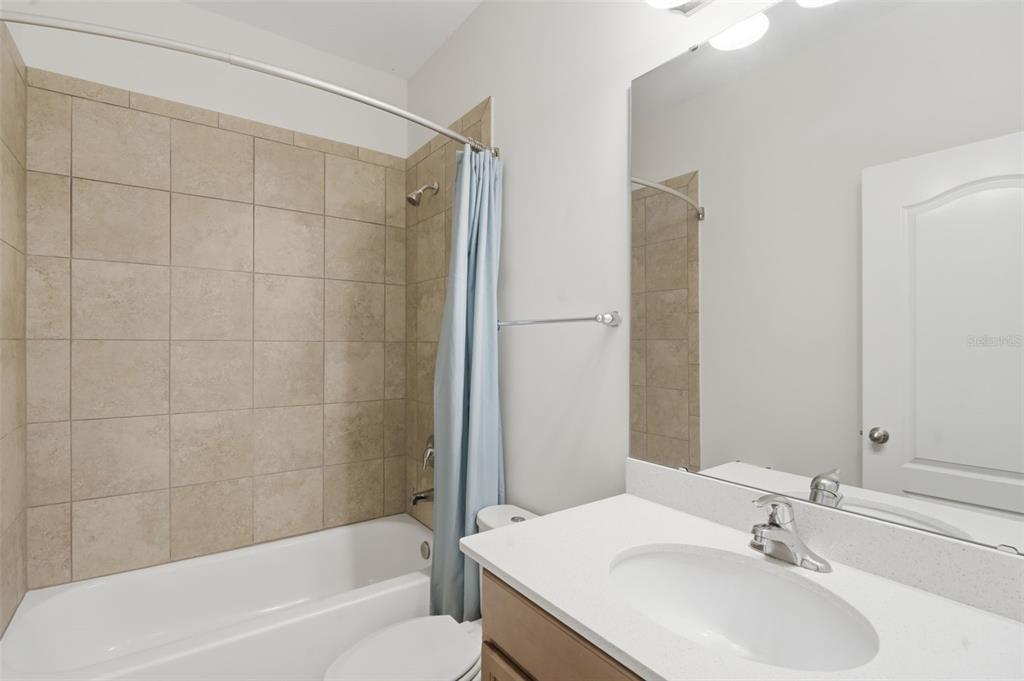 11486 Misty Oak Alley Windermere, FL 34786 - Photo 34 of 47 a bathroom with a sink shower and a bathtub