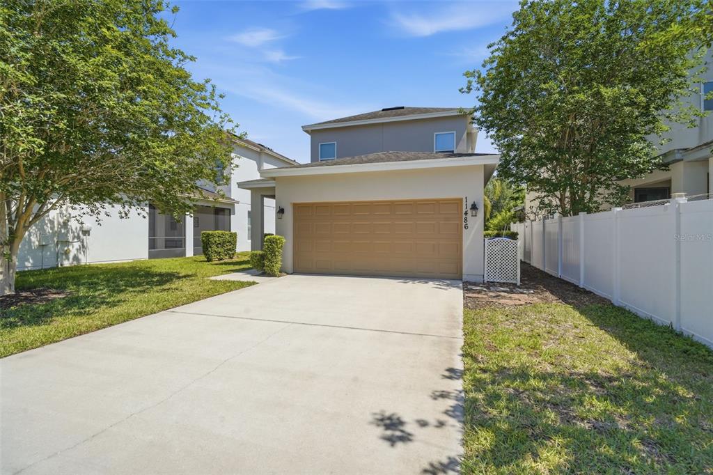 11486 Misty Oak Alley Windermere, FL 34786 - Photo 40 of 47 front view of house with a yard