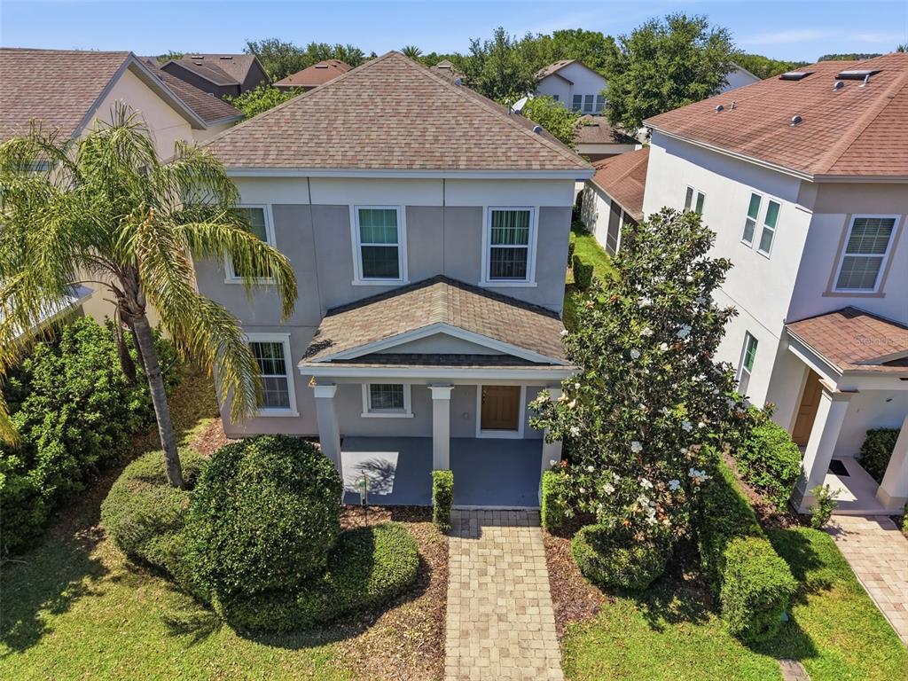 11486 Misty Oak Alley Windermere, FL 34786 - Photo 41 of 47 a front view of a house with a yard