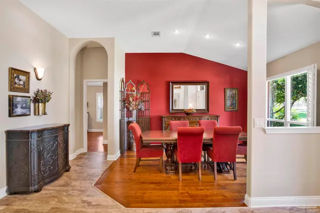a view of a dining room with furniture