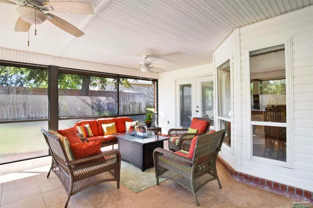 a outdoor living space with patio furniture and a garden