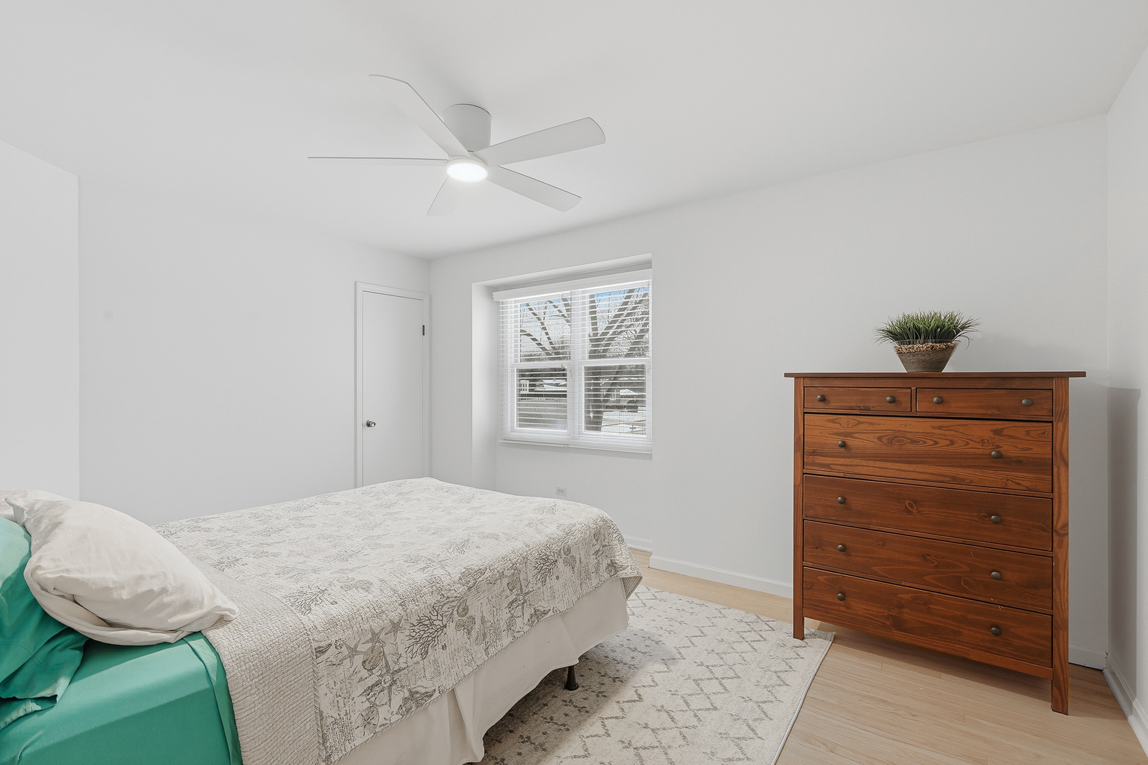 7209 Grant Street Darien, IL 60561 - Photo 27 of 36 a bedroom with a bed and a window