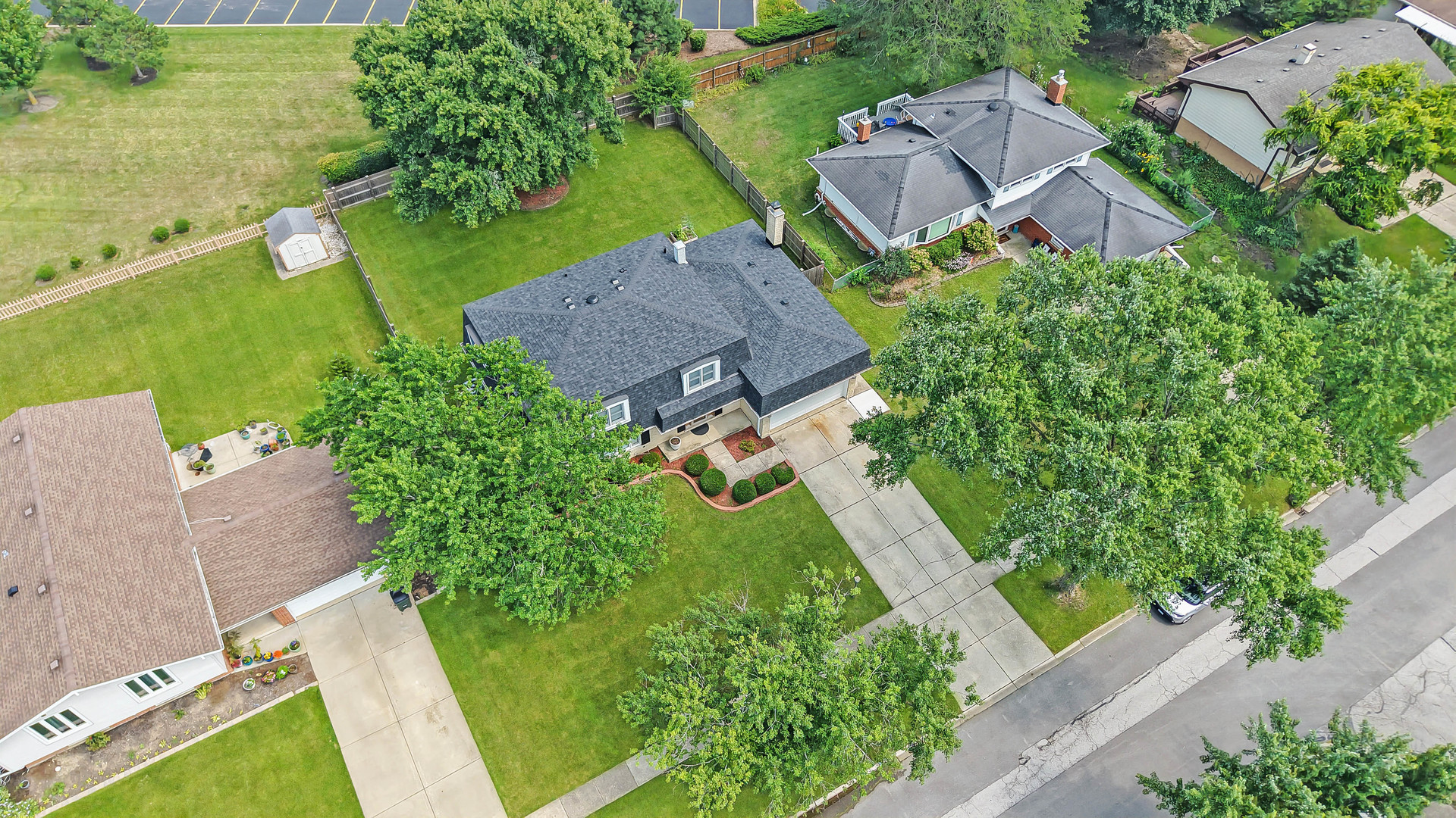 7209 Grant Street Darien, IL 60561 - Photo 7 of 36 an aerial view of a house with a garden