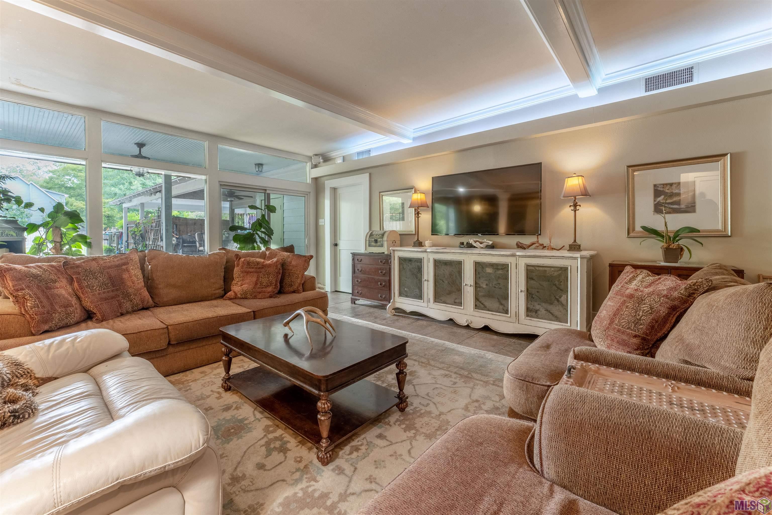 1904 Stanford Avenue Baton Rouge, LA 70808 - Photo 11 of 31 Den features tons of natural light with slate flooring