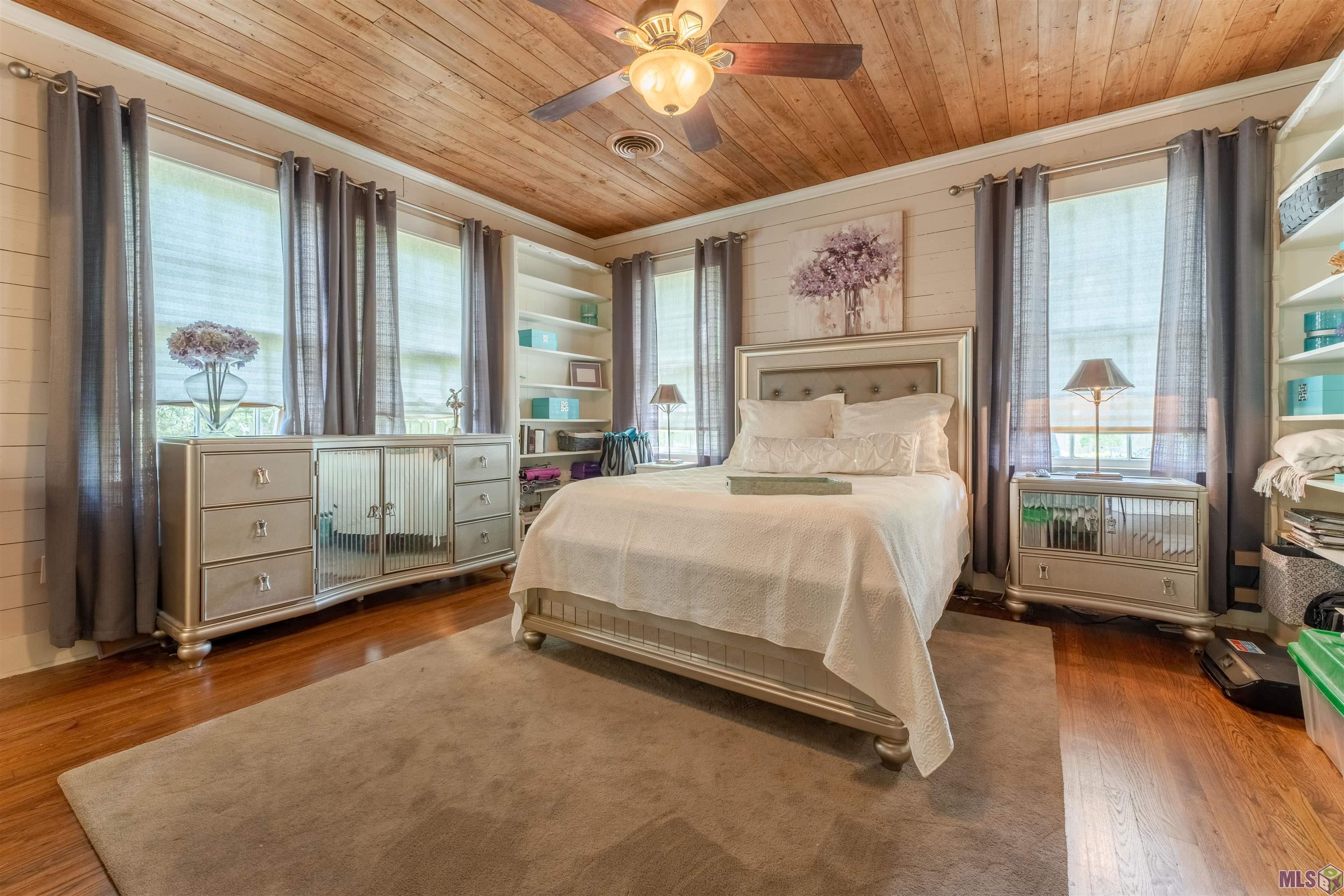 1904 Stanford Avenue Baton Rouge, LA 70808 - Photo 17 of 31 Another large bedroom with exposed Cyrpess and wood flooring!