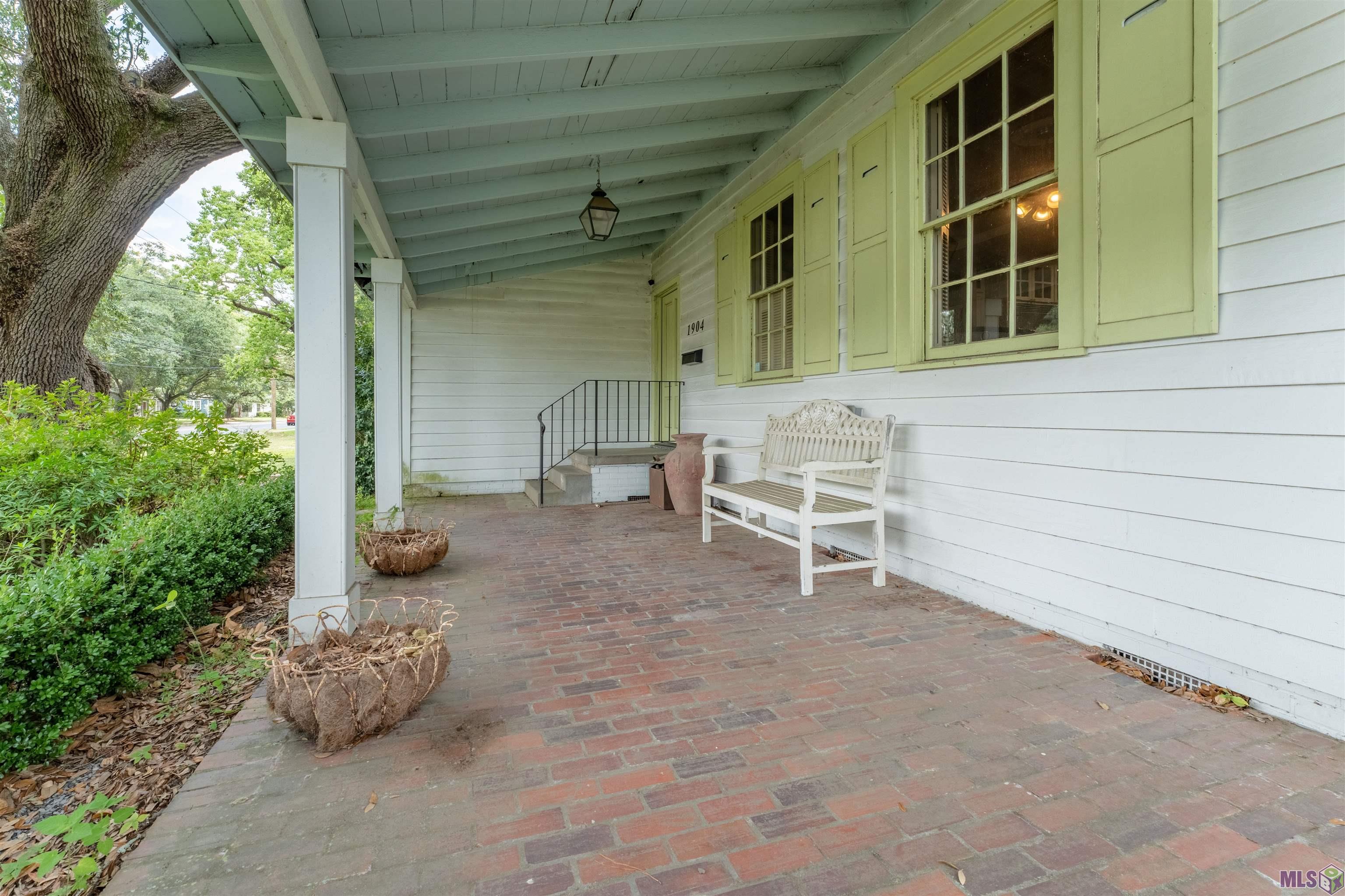 1904 Stanford Avenue Baton Rouge, LA 70808 - Photo 2 of 31 Large front porch overlooking beautiful Oak trees