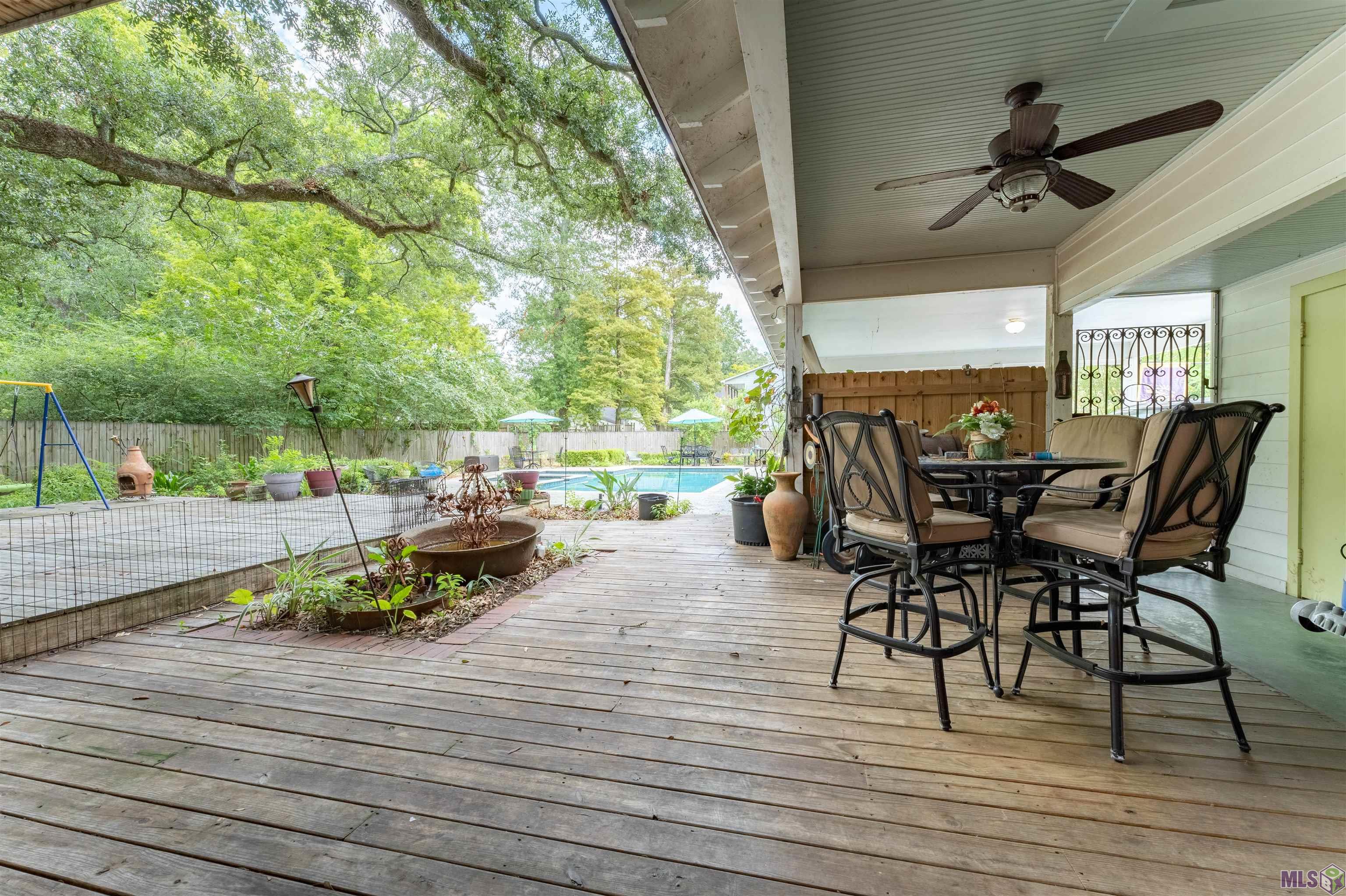 1904 Stanford Avenue Baton Rouge, LA 70808 - Photo 29 of 31 Covered area of back deck with Antique wrought iron gate