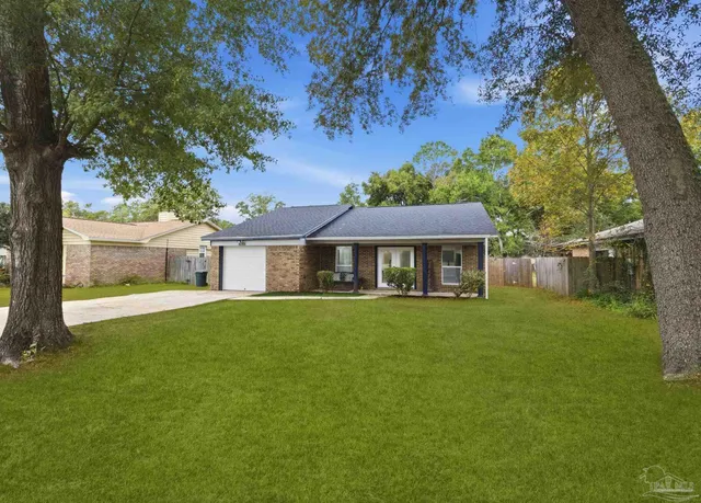 front view of a house with a yard