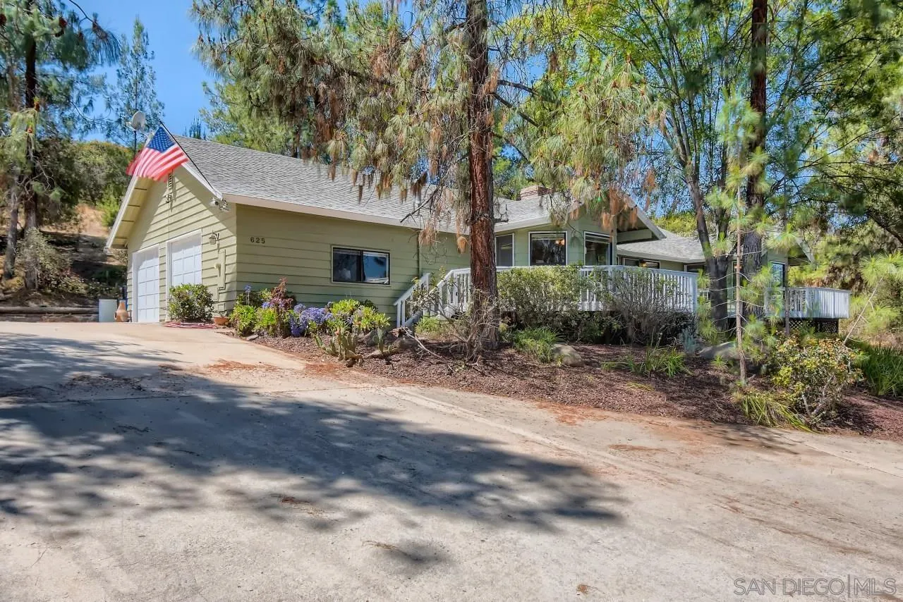 625 South Grade Road Alpine, CA 91901 - Photo 2 of 42 a front view of a house with garden