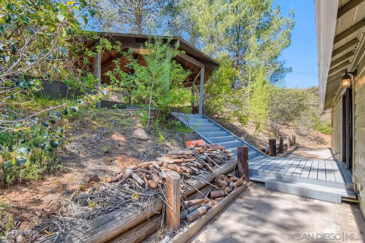 625 South Grade Road Alpine, CA 91901 - Photo 22 of 42 a view of a backyard with plants