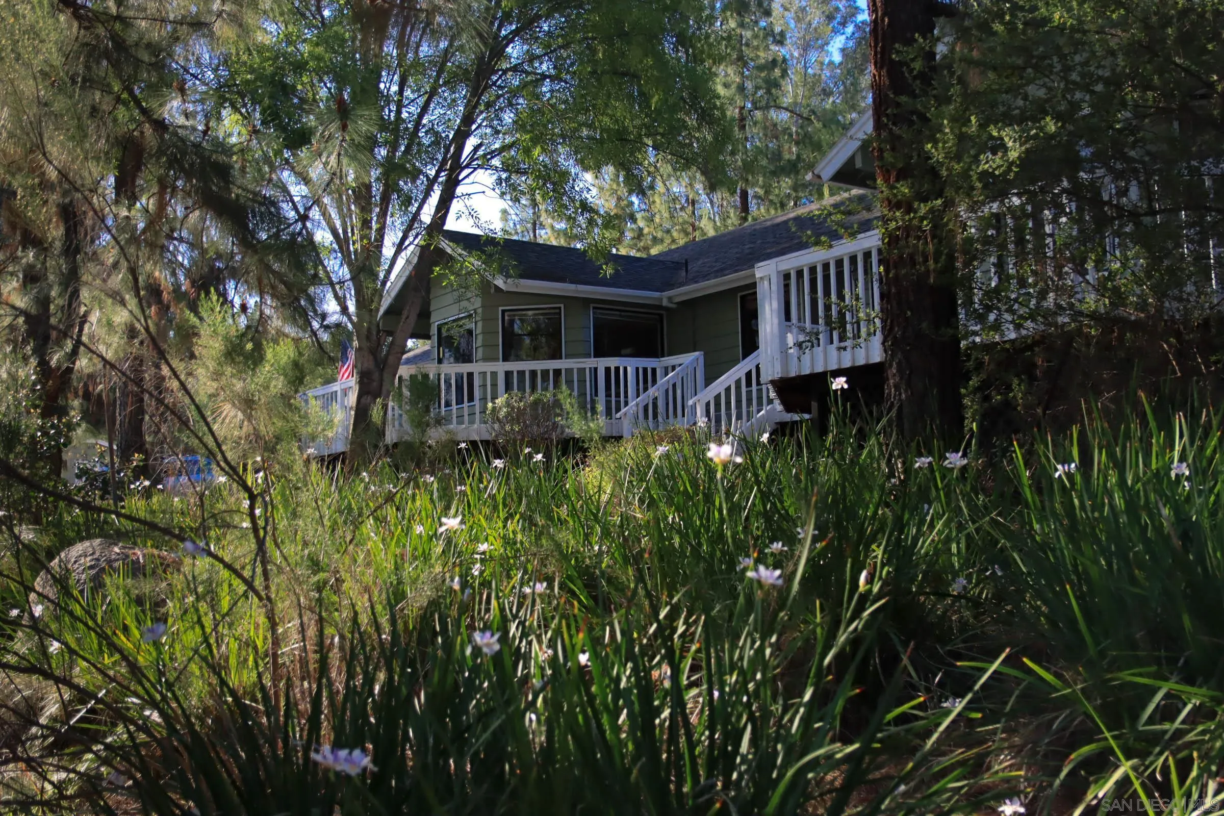 625 South Grade Road Alpine, CA 91901 - Photo 3 of 42 a view of a house with a tree