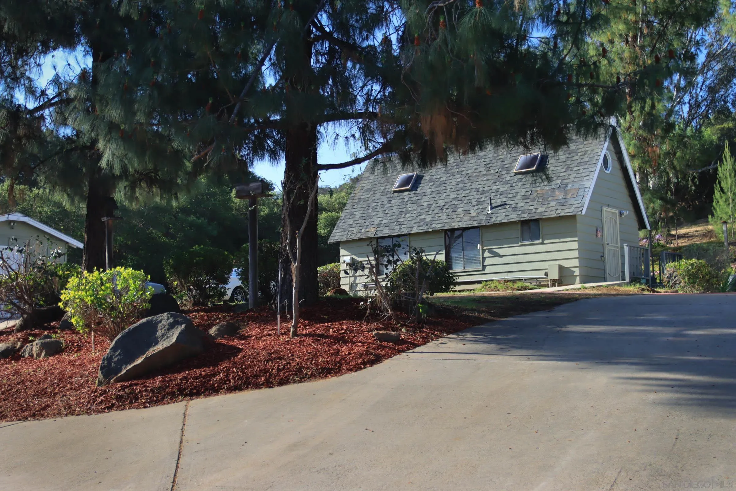 625 South Grade Road Alpine, CA 91901 - Photo 6 of 42 a front view of a house with a yard
