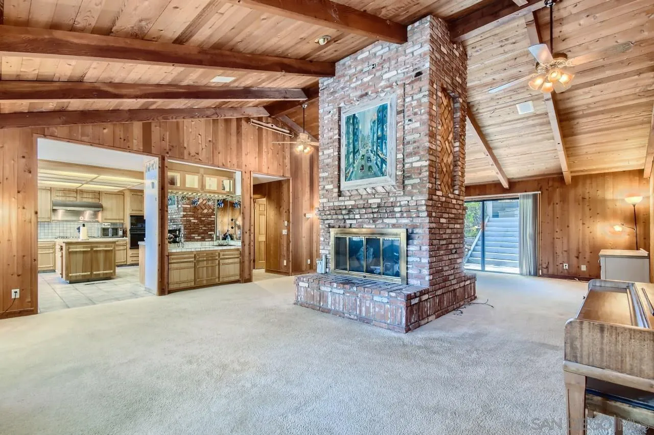 625 South Grade Road Alpine, CA 91901 - Photo 9 of 42 a living room with furniture and a fireplace
