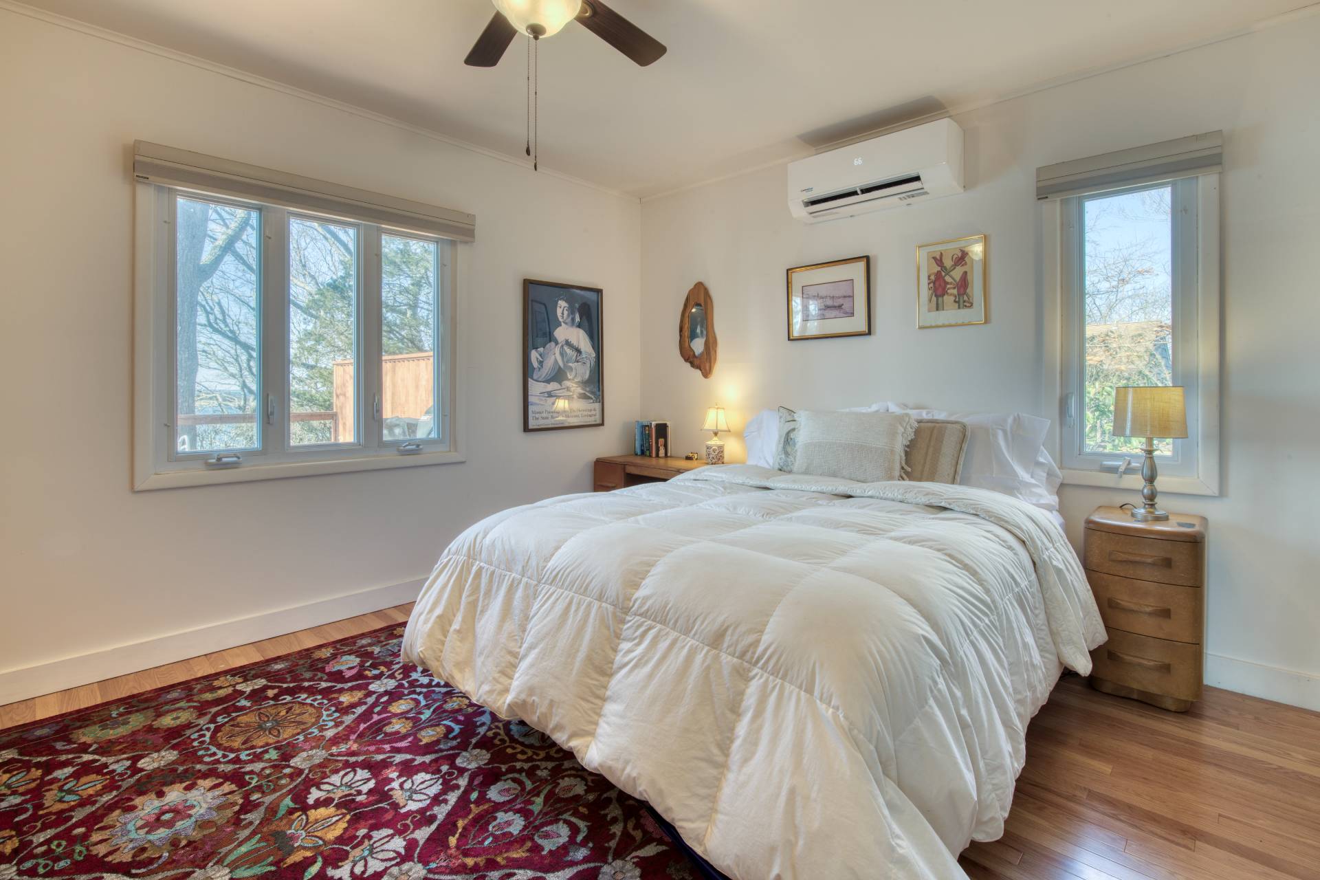 140 Redwood Road Sag Harbor, NY 11963 - Photo 6 of 14 a bedroom with a large bed and a window