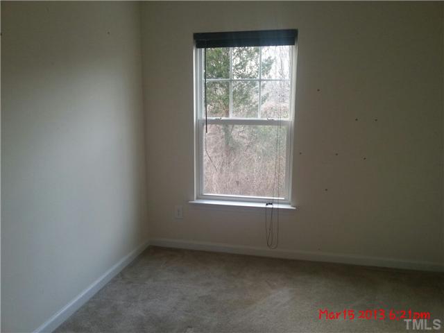 14411 Hamletville Street Raleigh, NC 27614 - Photo 11 of 16 an empty room with a window