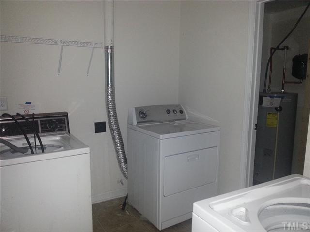 14411 Hamletville Street Raleigh, NC 27614 - Photo 13 of 16 a utility room with dryer and washer