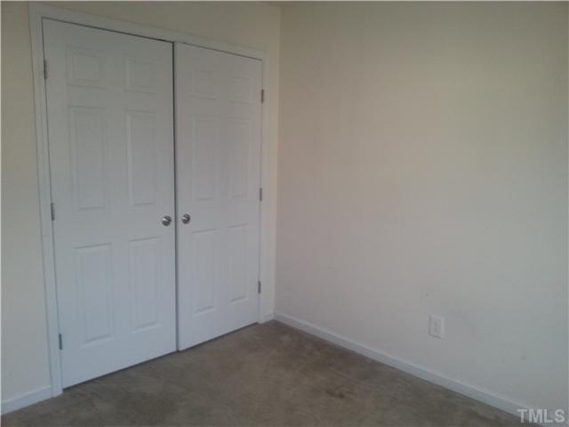 14411 Hamletville Street Raleigh, NC 27614 - Photo 14 of 16 a view of an empty room