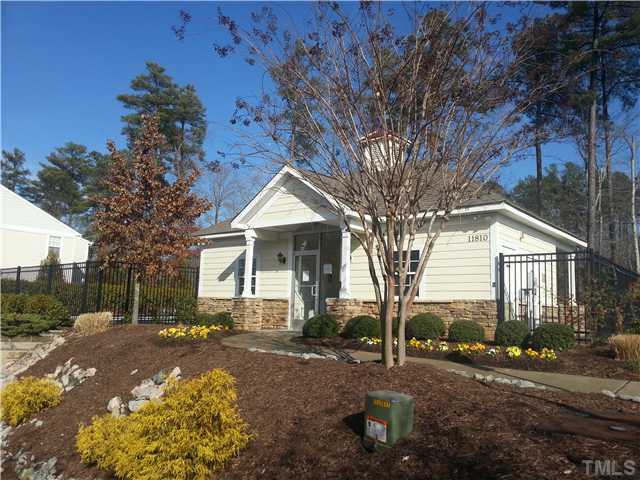 14411 Hamletville Street Raleigh, NC 27614 - Photo 15 of 16 a front view of a house with a yard