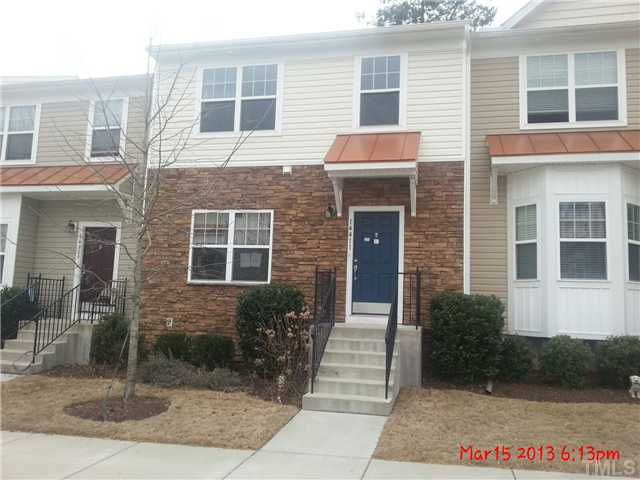 14411 Hamletville Street Raleigh, NC 27614 - Photo 2 of 16 a front view of a house with a yard