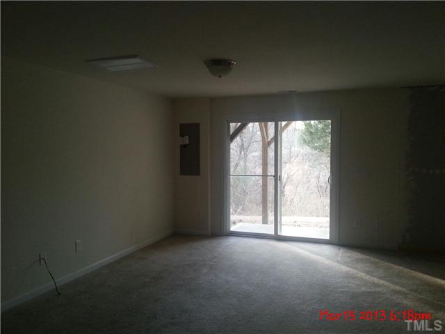 14411 Hamletville Street Raleigh, NC 27614 - Photo 10 of 16 an empty room with windows