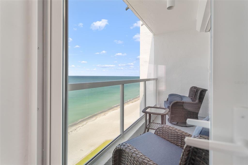 1050 Longboat Club Road, Unit 901 Longboat Key, FL 34228 - Photo 18 of 37 a room with furniture and a window