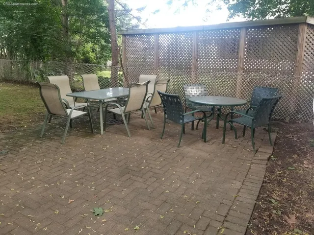 a view of a outdoor space with a table and chairs