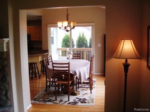 3799 Deer Ridge Metamora, MI 48455 - Photo 10 of 19 Open Dining and Doorwall to Deck