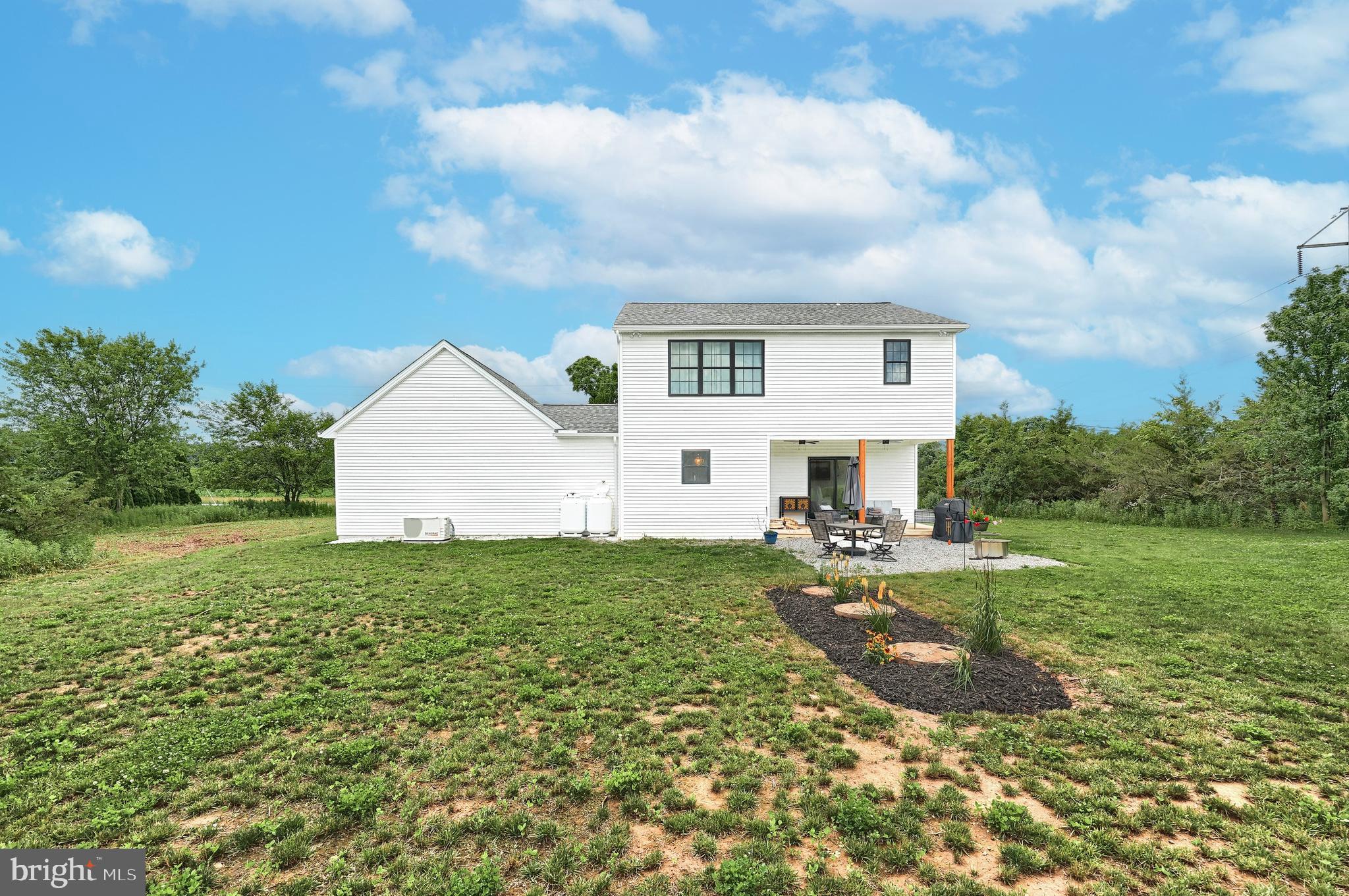 4575 Lewisberry Road York, PA 17404 - Photo 12 of 56 a view of a house with backyard and garden