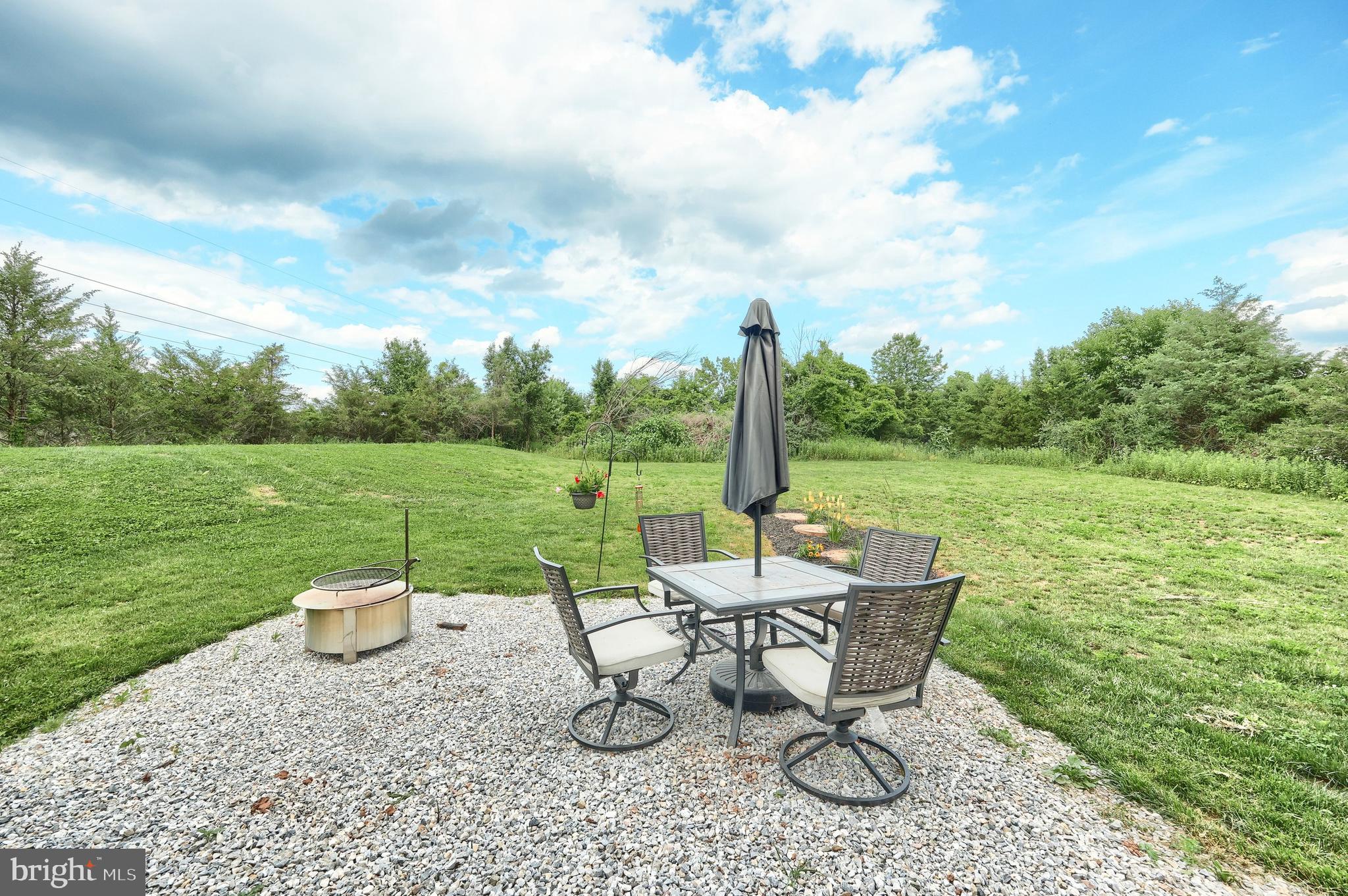4575 Lewisberry Road York, PA 17404 - Photo 14 of 56 a view of a table and chairs in the garden