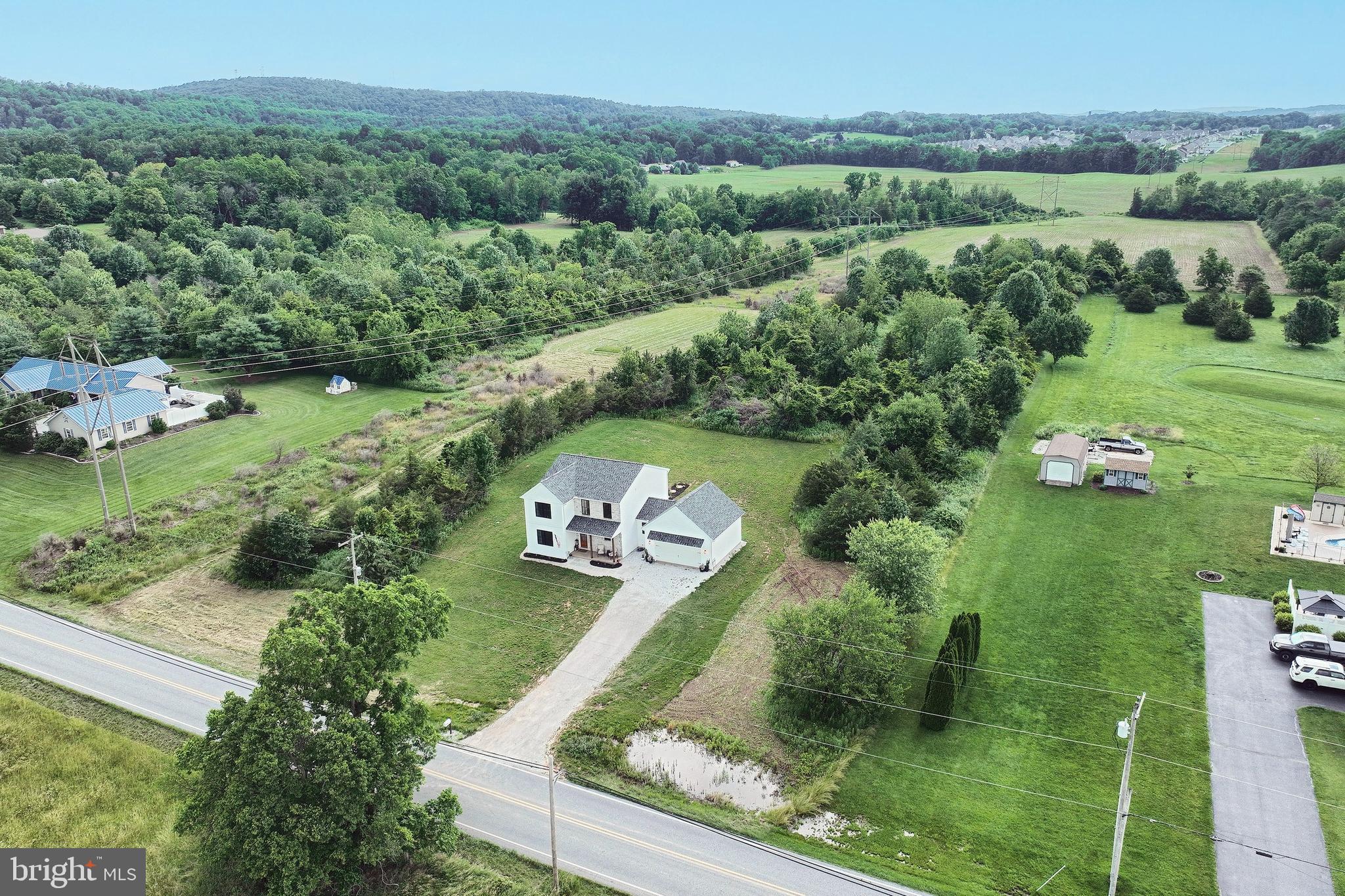 4575 Lewisberry Road York, PA 17404 - Photo 2 of 56 an aerial view of a house with a yard