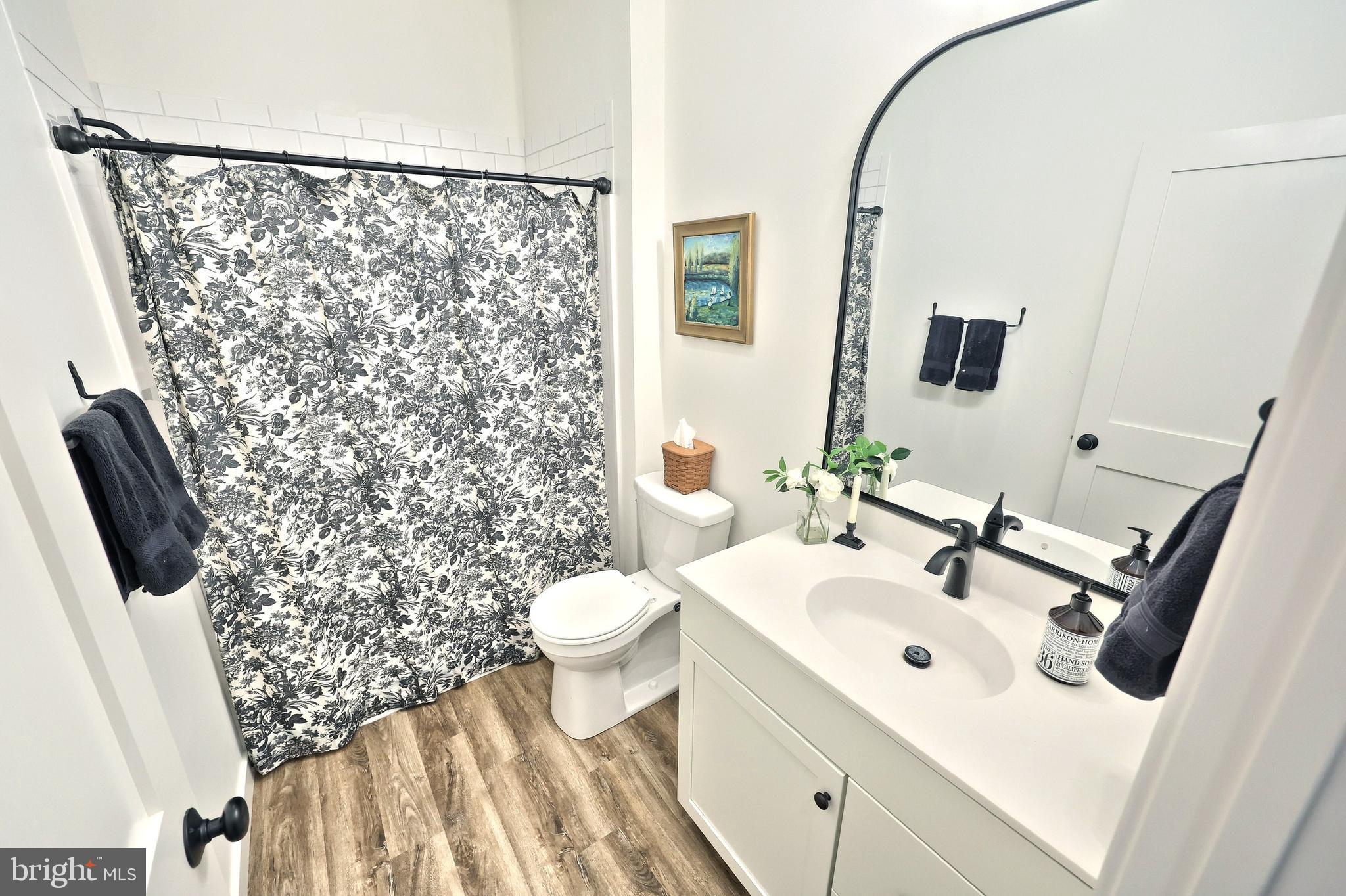 4575 Lewisberry Road York, PA 17404 - Photo 28 of 56 a bathroom with a sink toilet and shower