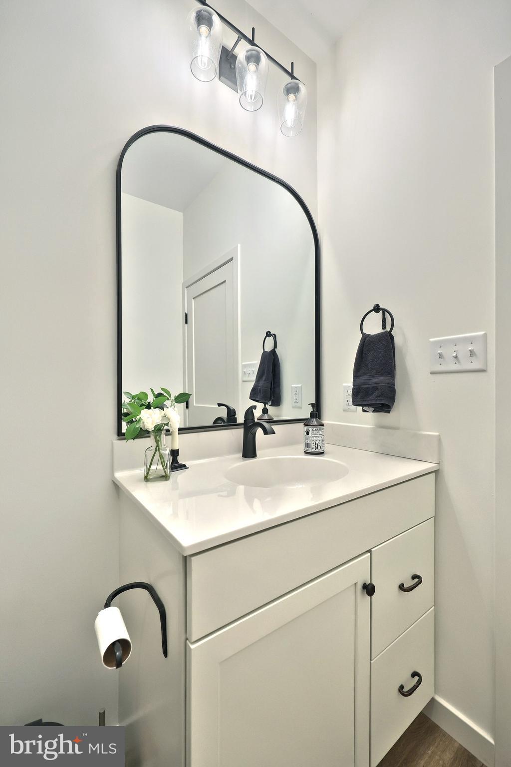 4575 Lewisberry Road York, PA 17404 - Photo 29 of 56 a bathroom with a double vanity sink and mirror