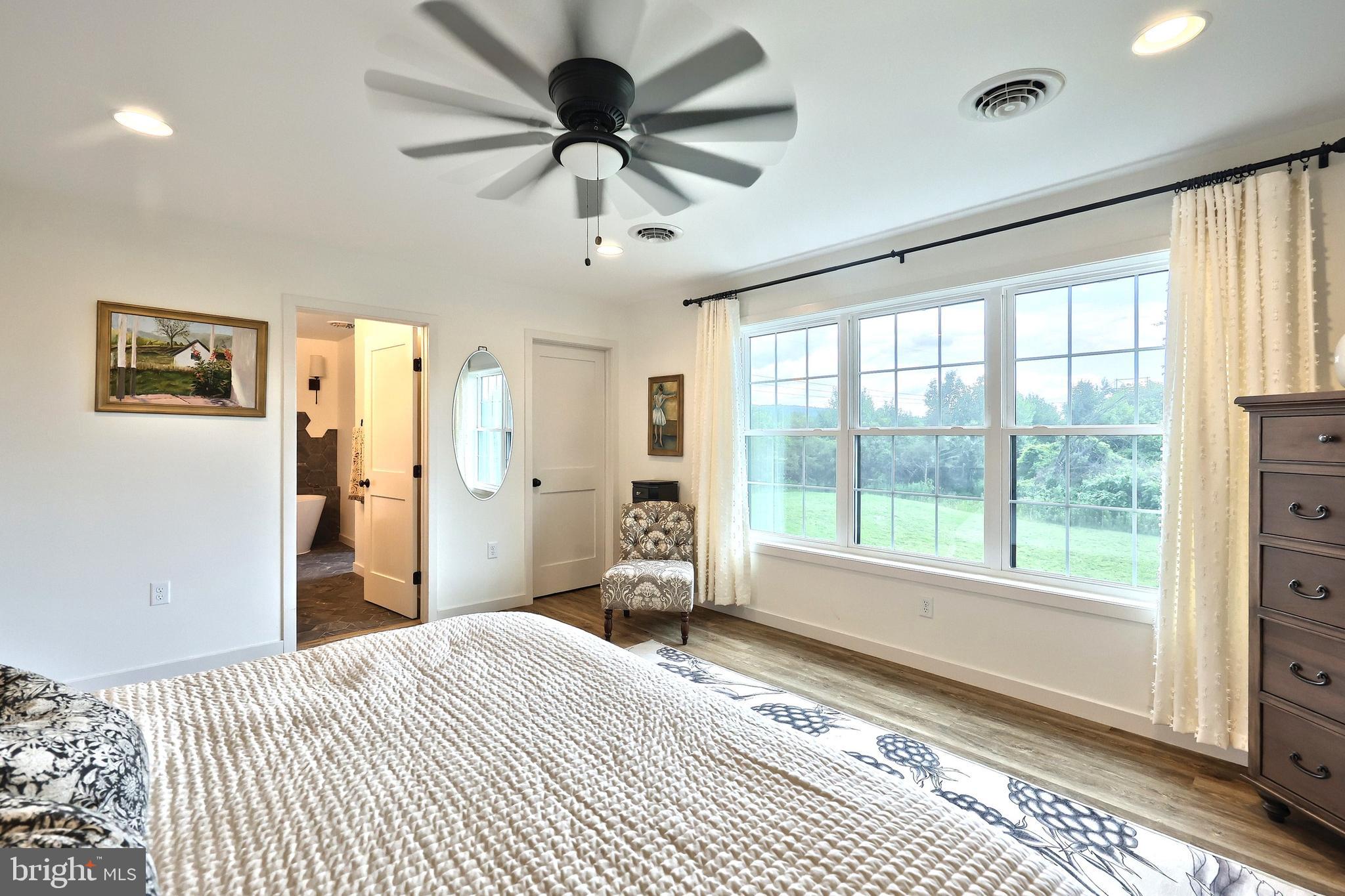 4575 Lewisberry Road York, PA 17404 - Photo 41 of 56 a bedroom with a bed and a large window