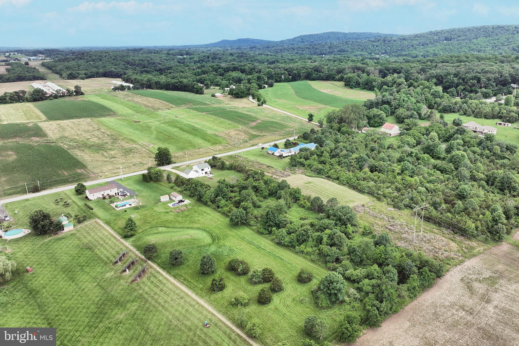 4575 Lewisberry Road York, PA 17404 - Photo 53 of 56 a view of a lush green hillside and houses