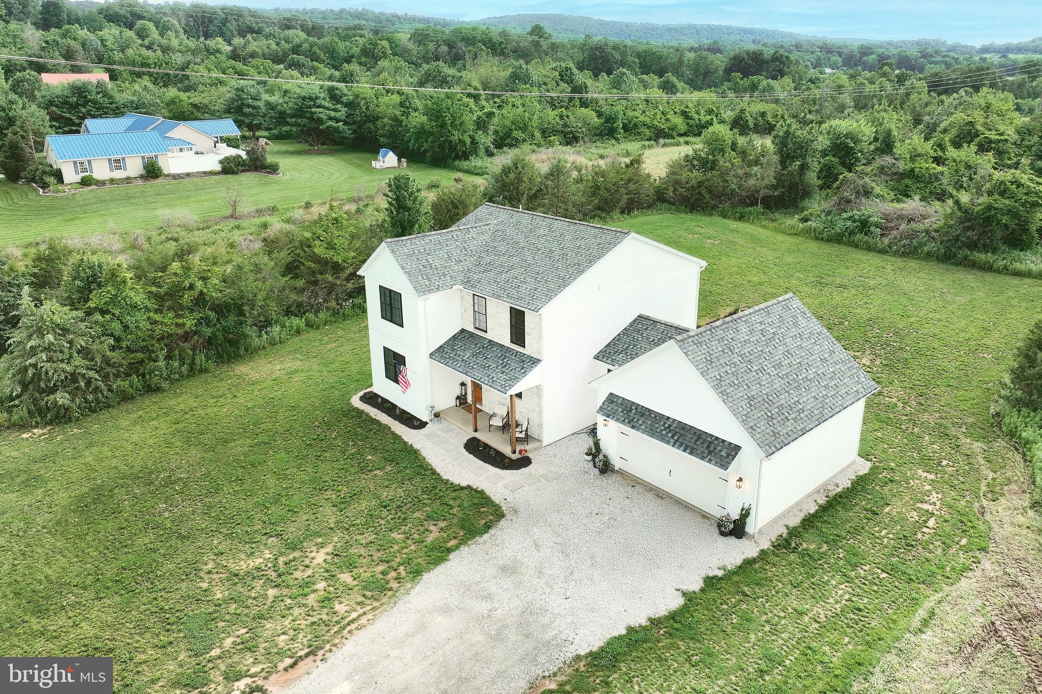 4575 Lewisberry Road York, PA 17404 - Photo 56 of 56 an aerial view of a house with garden