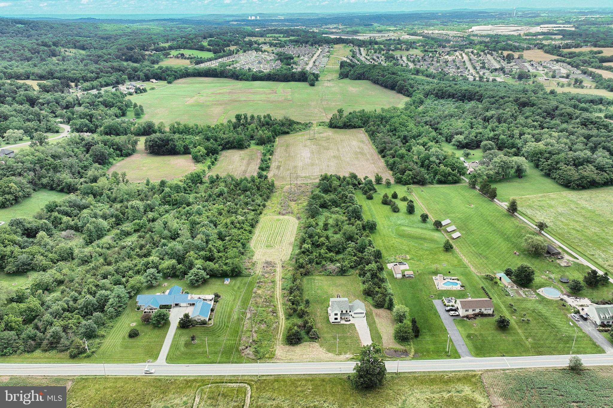 4575 Lewisberry Road York, PA 17404 - Photo 6 of 56 an aerial view of a residential houses with outdoor space and trees