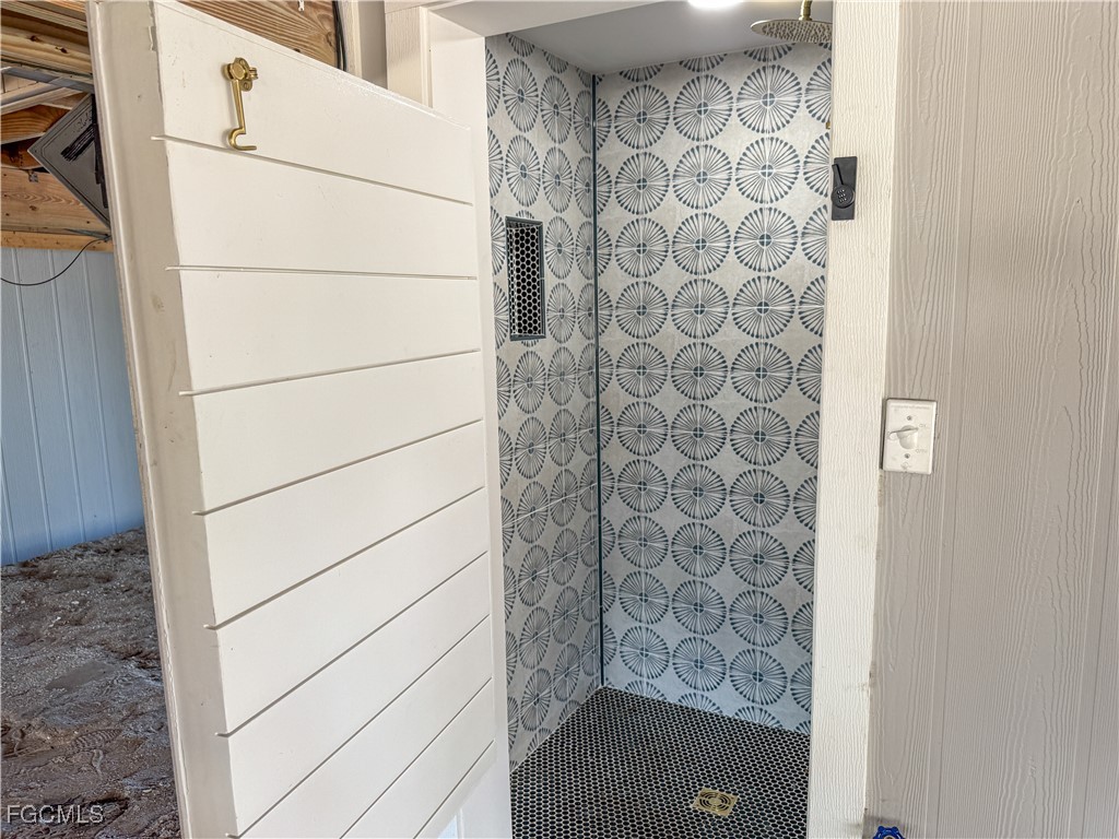 1411 Beach Cottages, Unit 1411 Captiva, FL 33924 - Photo 35 of 40 a bathroom with a shower