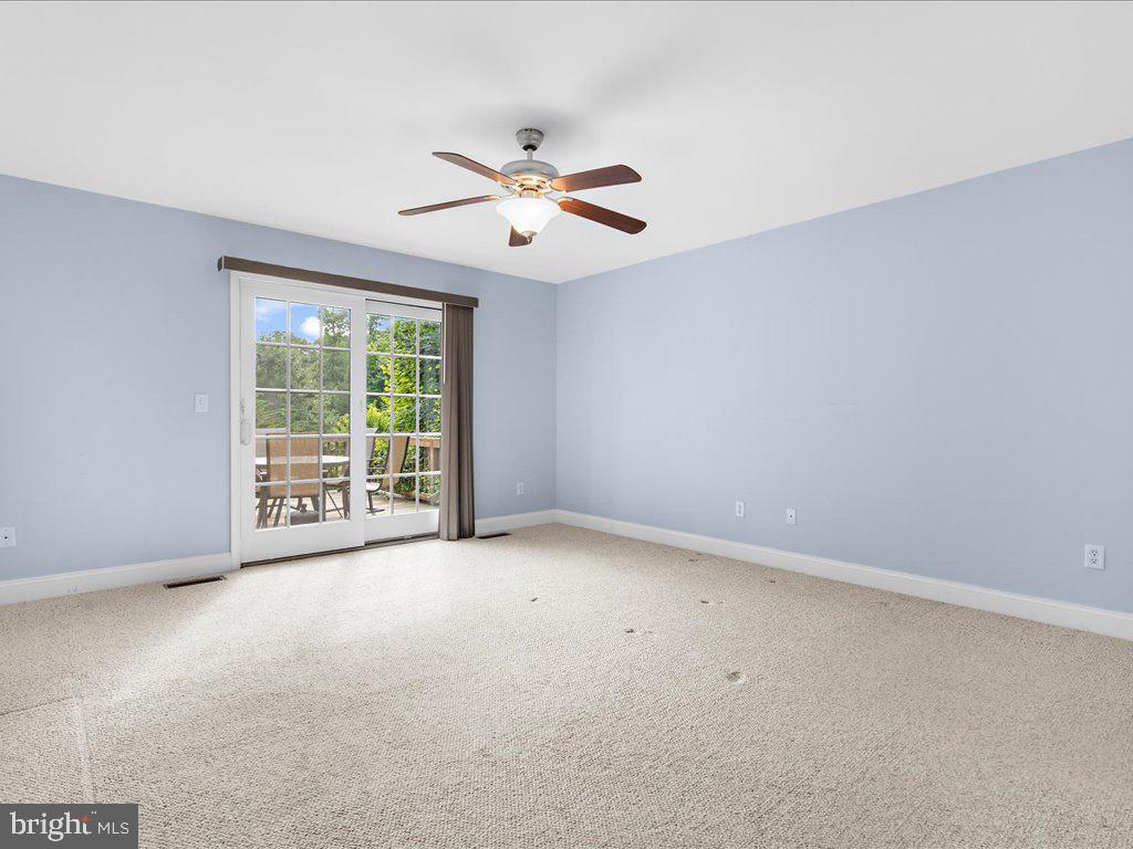 6153 Tolchester Road Rock Hall, MD 21661 - Photo 16 of 60 1st Floor Primary Suite! Exit to Deck