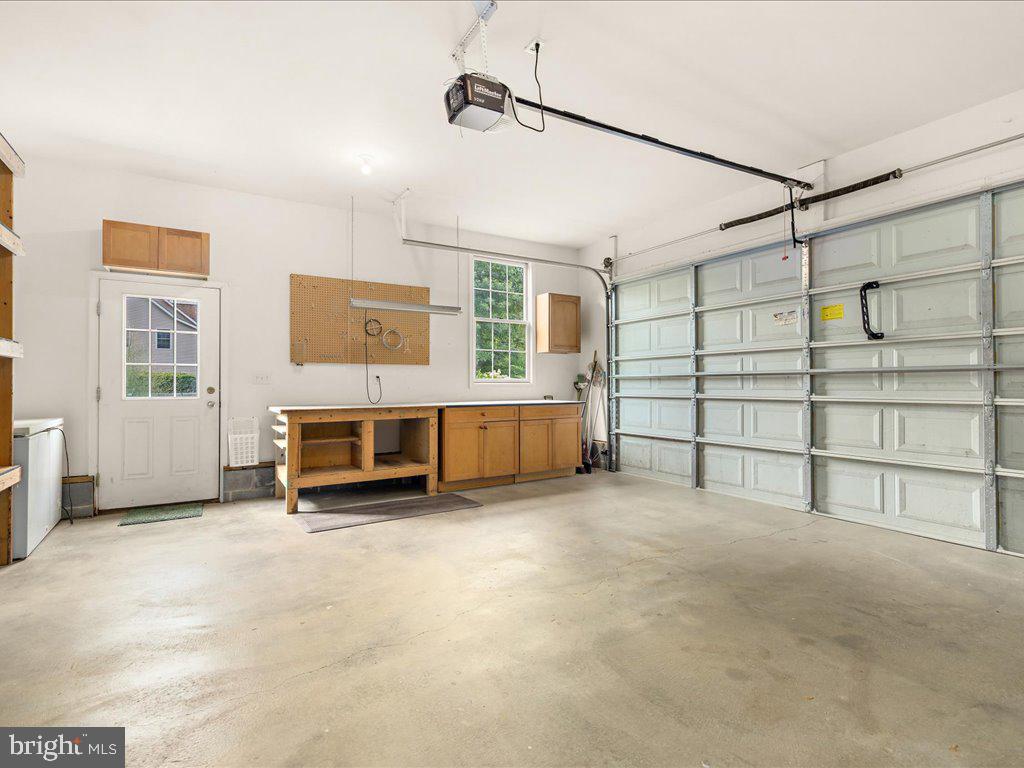 6153 Tolchester Road Rock Hall, MD 21661 - Photo 38 of 60 Two car garage w/entry to side yard and workbench