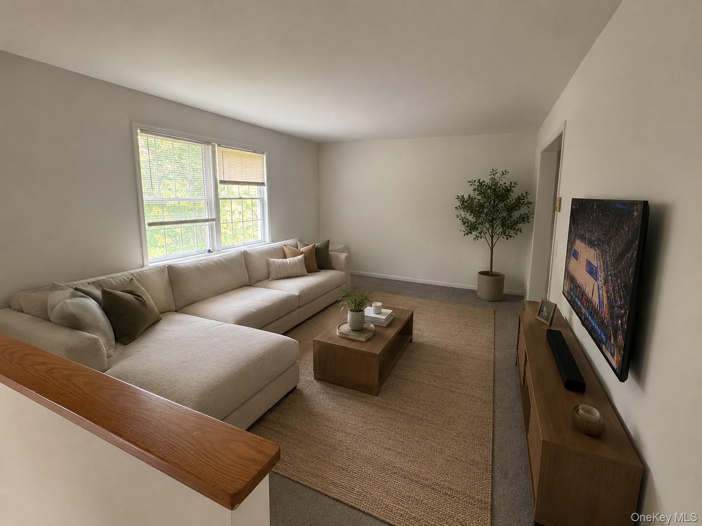 272 Van Wyck Lake Road Fishkill, NY 12524 - Photo 4 of 27 a living room with furniture and a flat screen tv