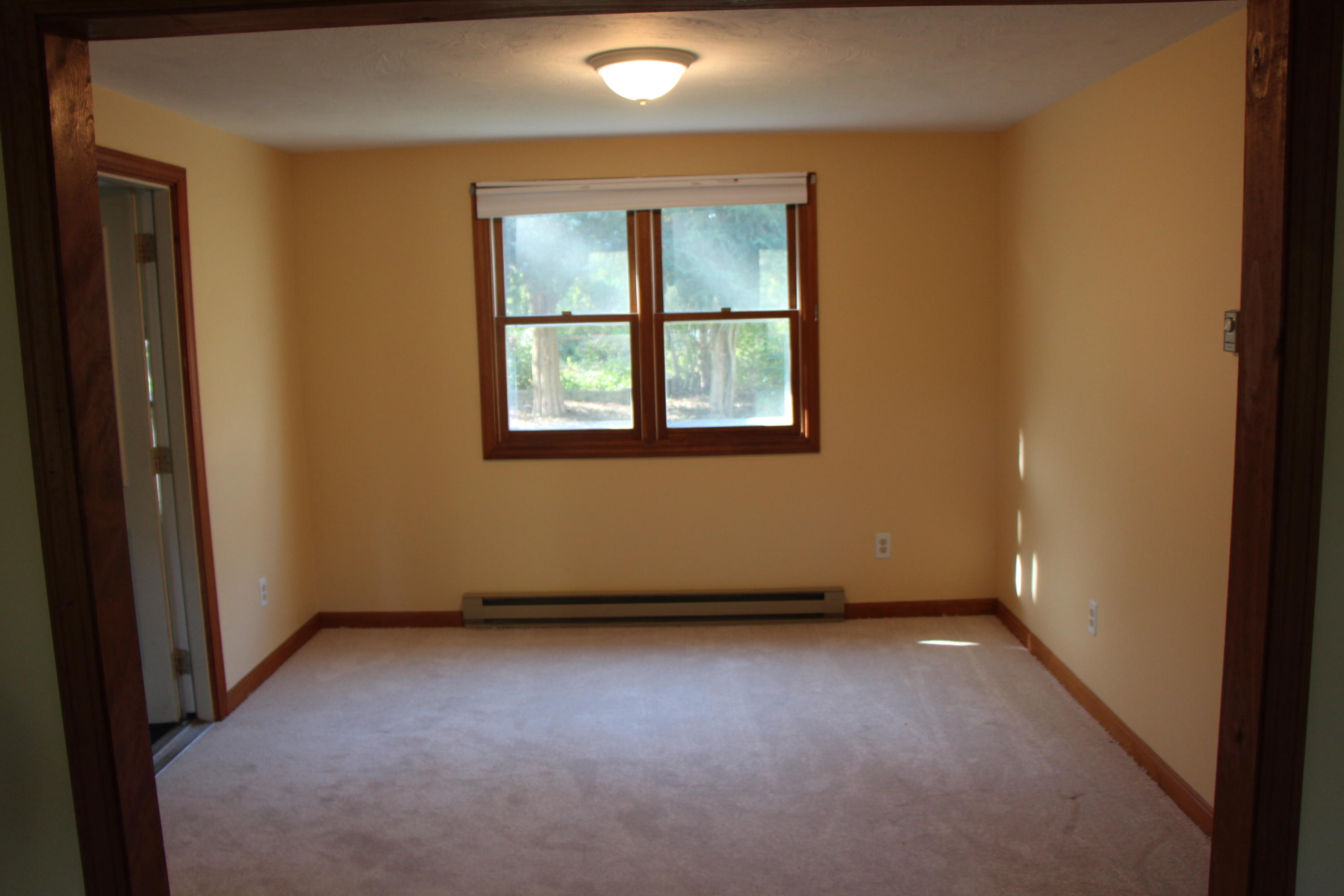 1 Bell Road Bourne, MA 02532 - Photo 3 of 21 an empty room with a window
