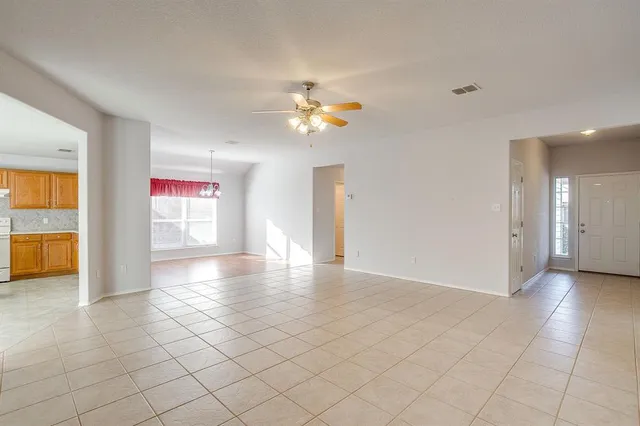 a kitchen with stainless steel appliances granite countertop a sink and a granite counter tops