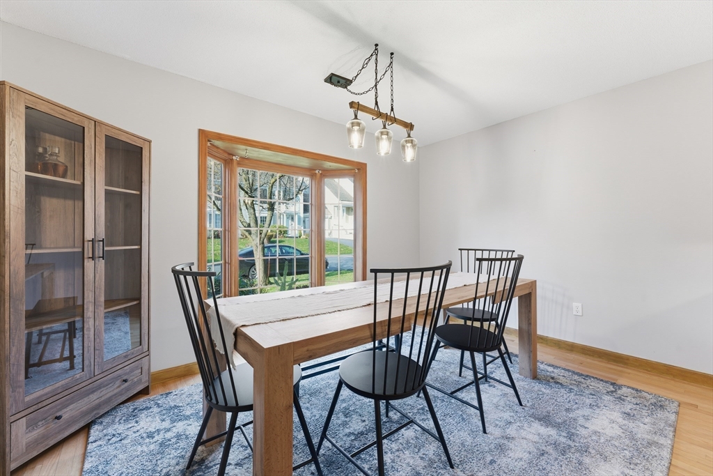36 Shady Brook, Unit 36 West Springfield, MA 01089 - Photo 4 of 19 a view of a dining room with furniture window and wooden floor